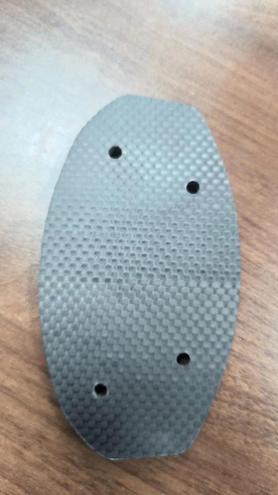 CNC machined carbon fiber mounting plate with holes